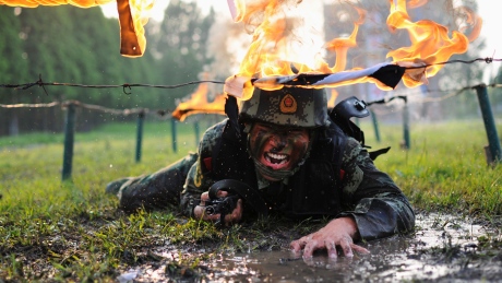 Chinese paramilitary police train on land, water — even mid-air