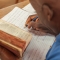 Bible charity vows to continue translation work after murders of four employees